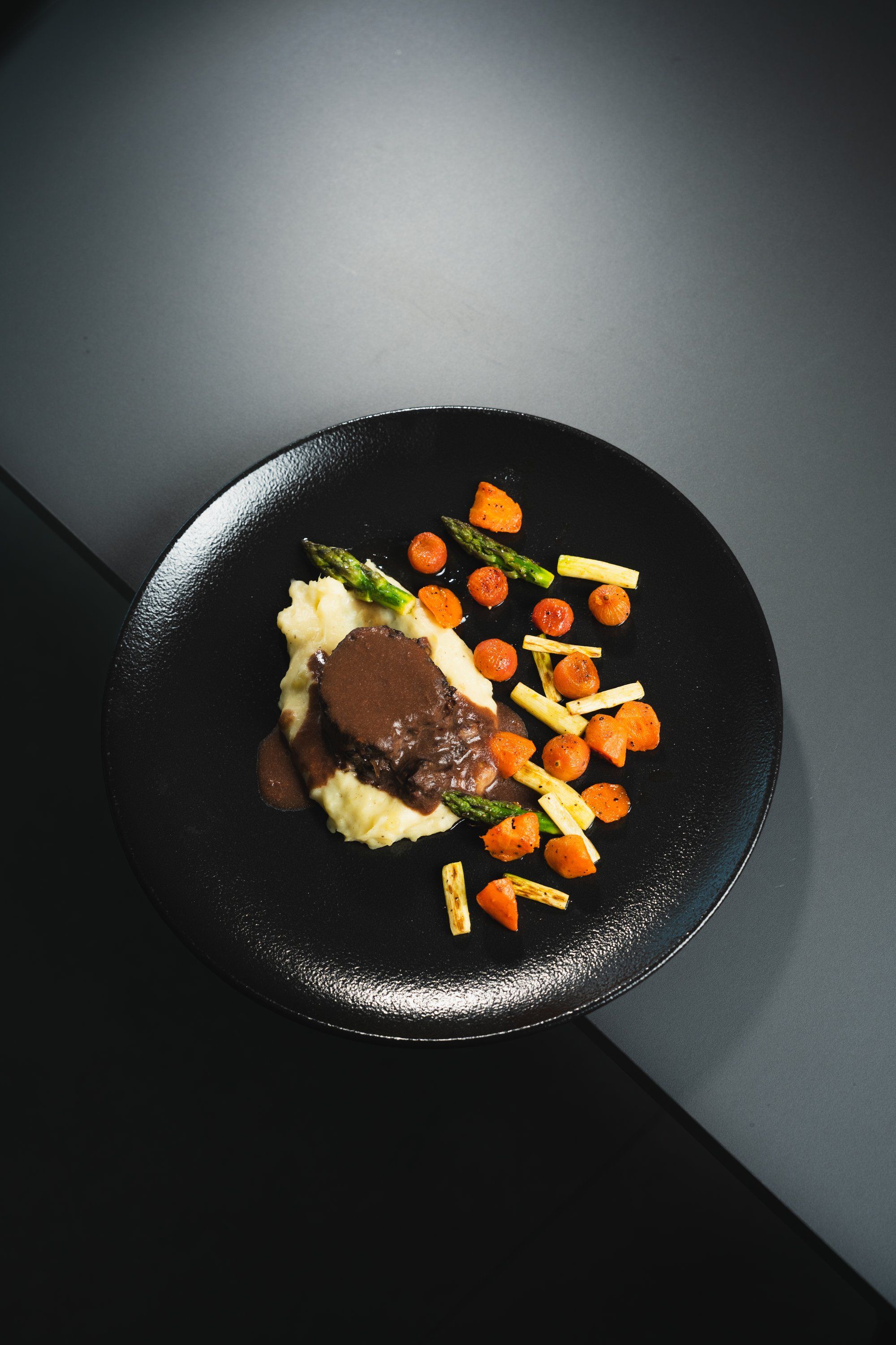 Beef tataki with creamed morels and baby vegetables